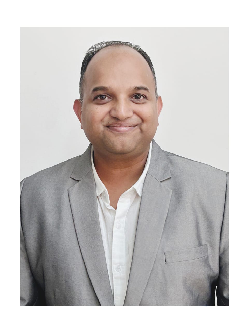 Dr. Ajit Ashok Muzumdar